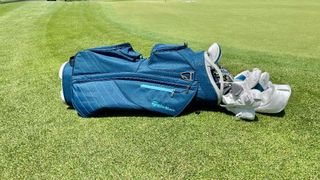 TaylorMade Kalea Premier cart bag lying on the ground