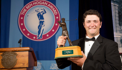 Jon Rahm holds the Ben Hogan Award after winning it in 2015